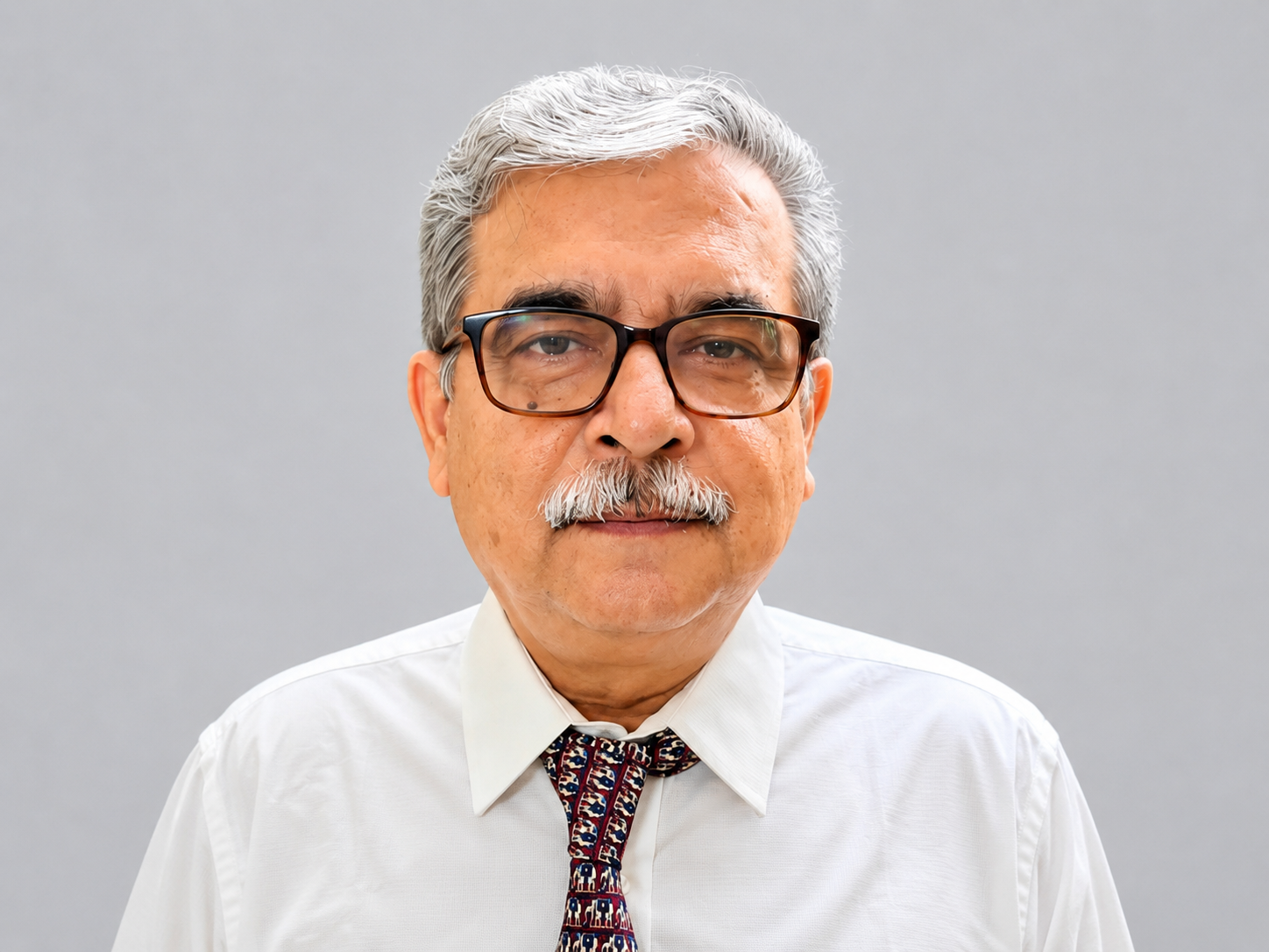 Portrait of Dr. Nitai Chandra Kundu, Founder & Chairman of SKNM Trust